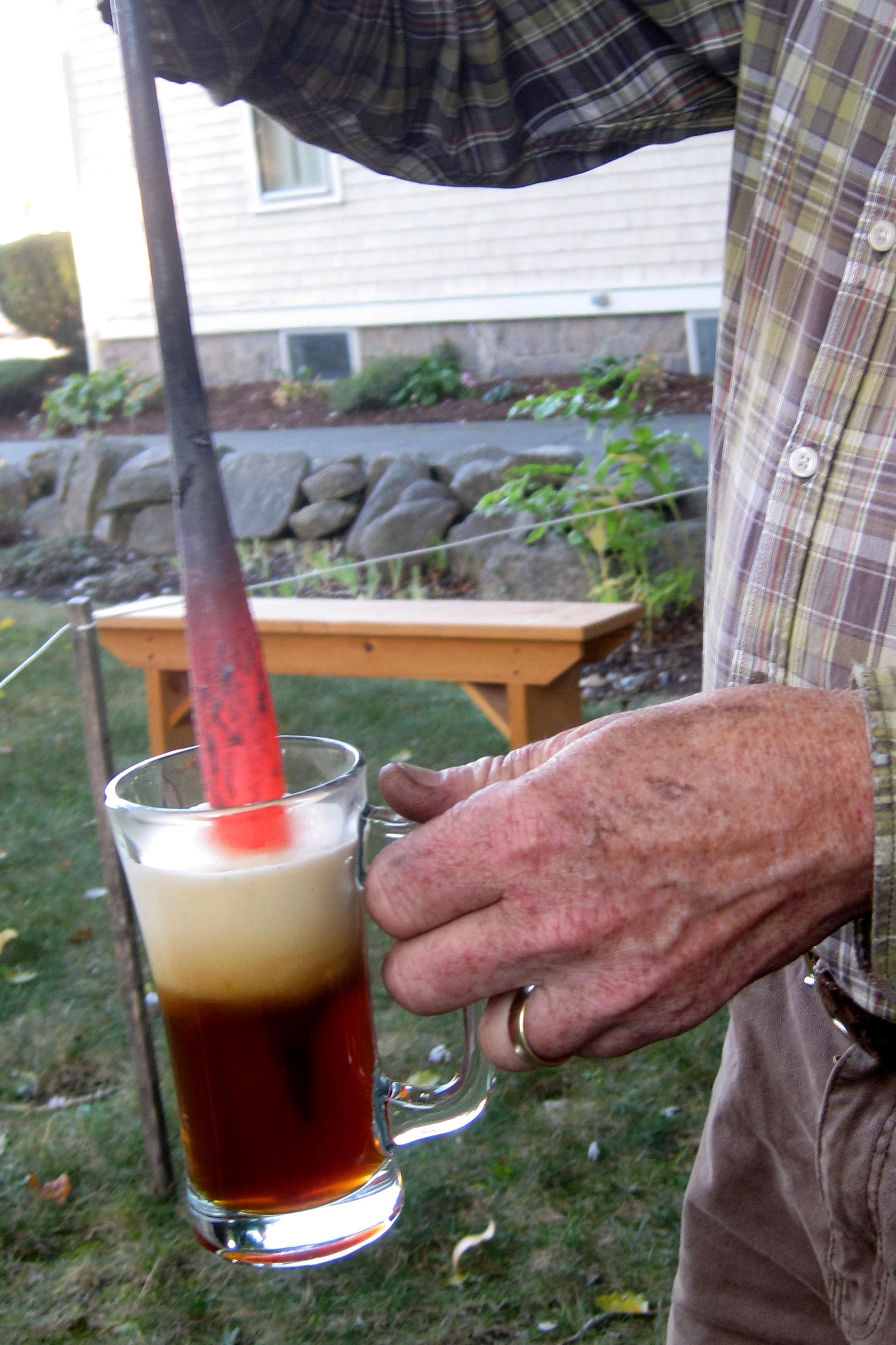 Making Flip with a Red-Hot Poker - photo by Richmond Talbot