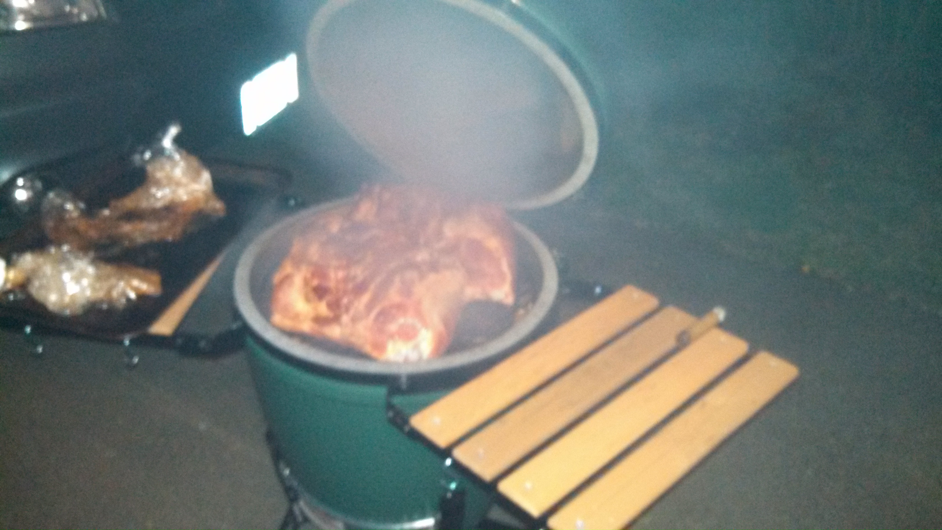 Pork Shoulder in Smoker, Photo by Brad Goodness