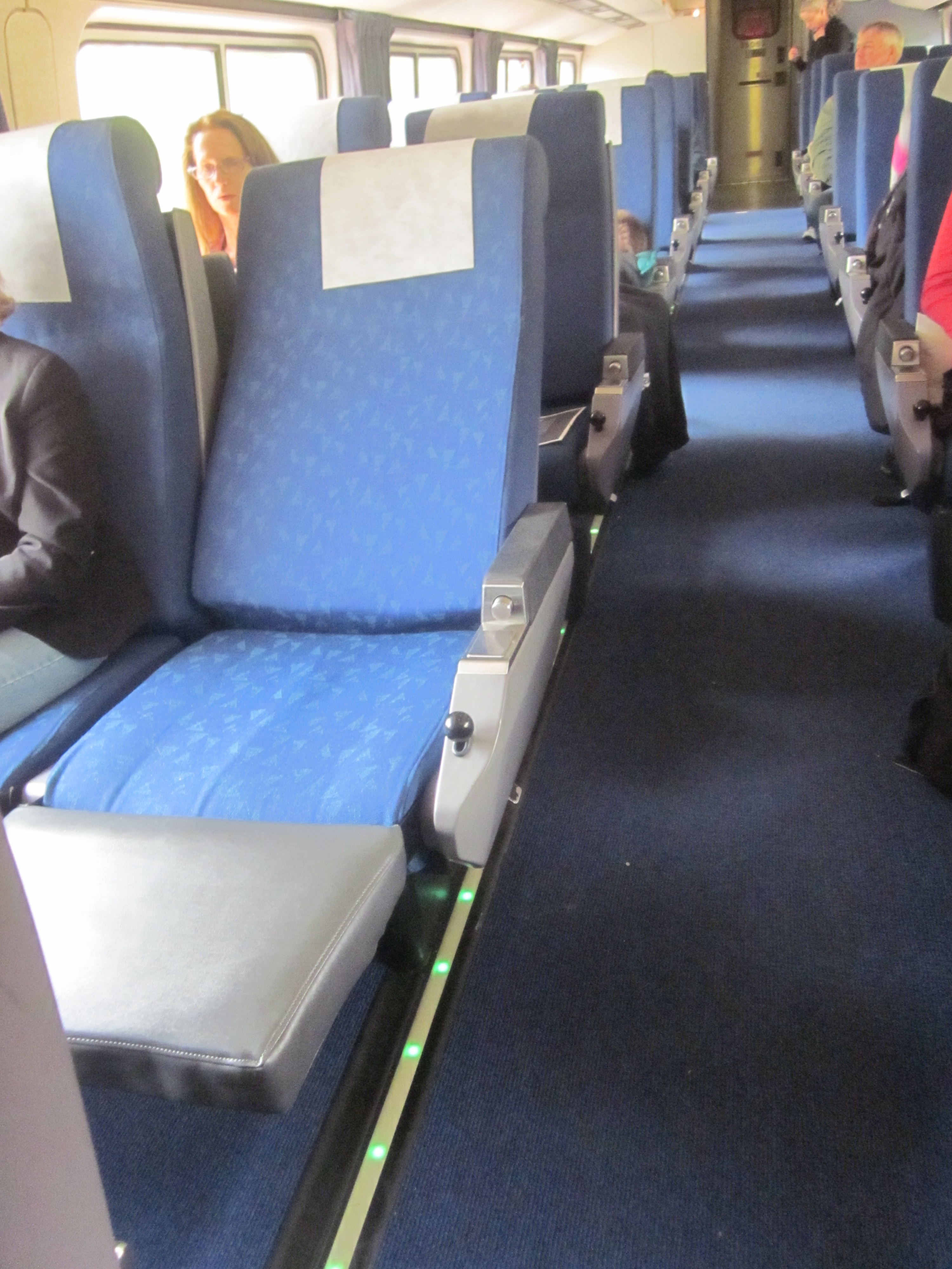 A coach-class seat fully reclined