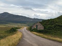 "A single lane road in the Western Highlands"