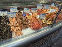 "A fishmonger at the Ancien Marche in Rouen"