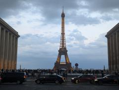 "Lighting the Tour Eiffel at dusk"
